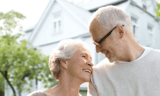 A senior couple enjoying a walk outside